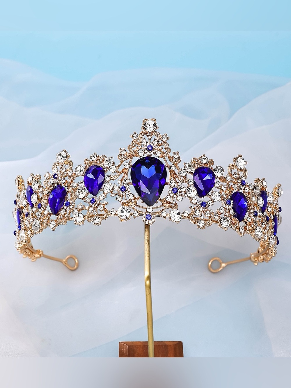 Elegant Gold Tiara with Deep Blue Gemstones